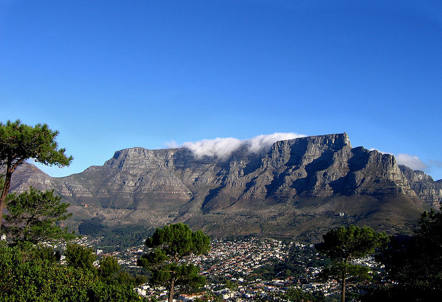 Table Mountain is a flat-topped mountain forming a prominent landmark overlooking the city of Cape Town in South Africa, and is featured in the flag of Cape Town and other...