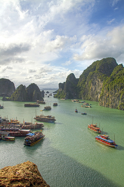 Lots of junk boats transporting tourists around Halong Bay, Vietnam