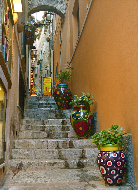 Flower vases on the streets of Taormina / Italy